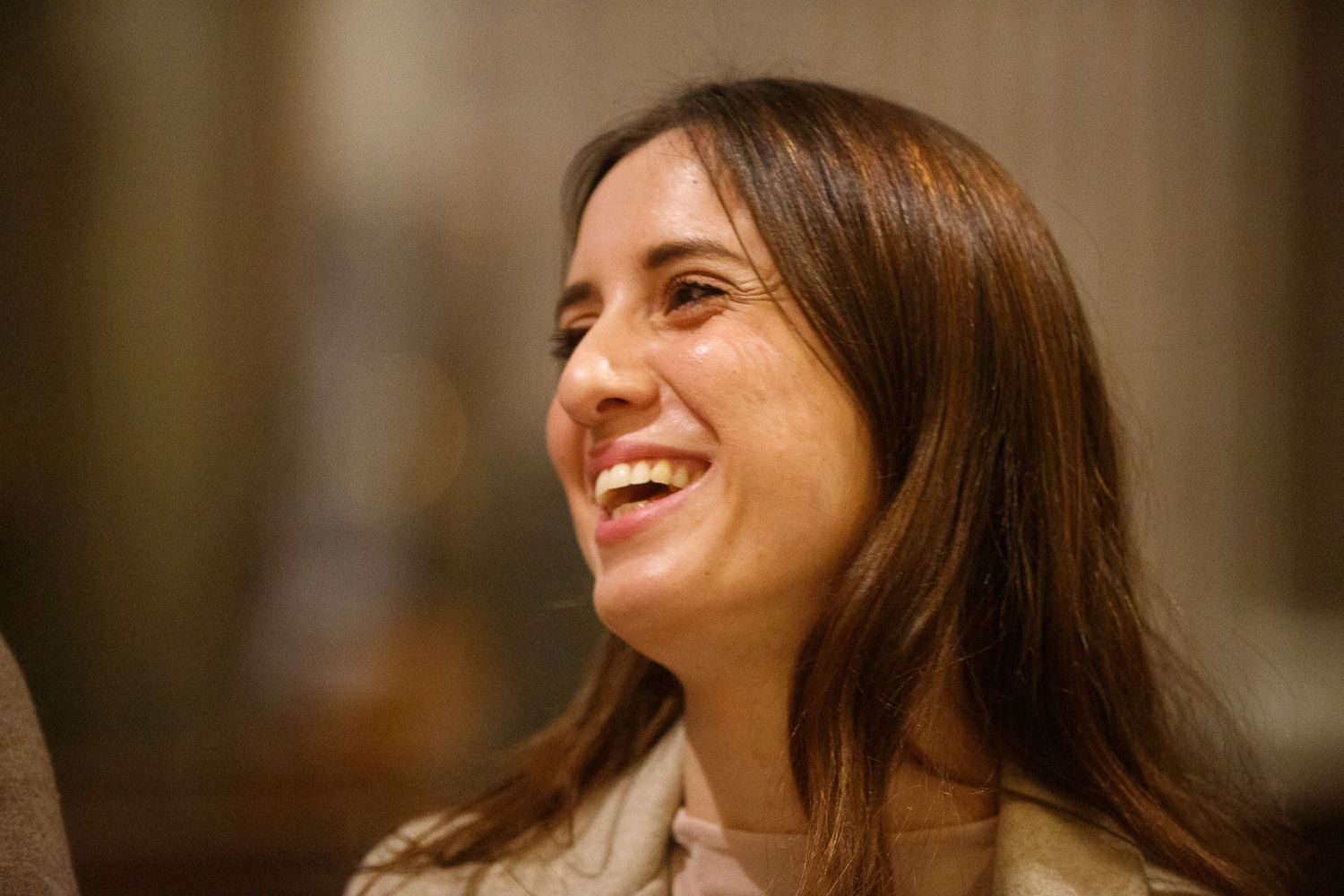 Candid portrait series showing joyful expressions and laughter.