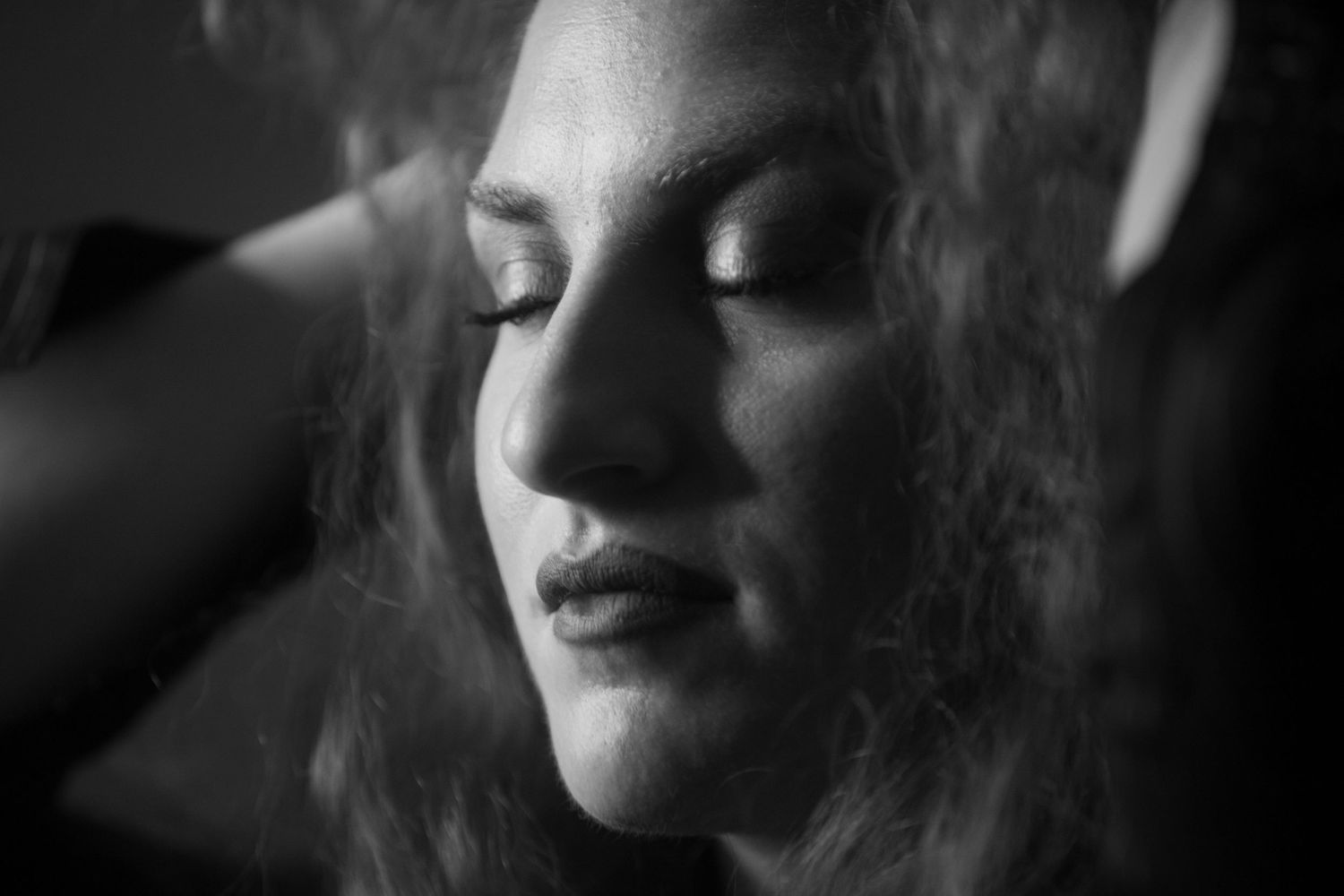 Artistic black and white close-up portrait series.