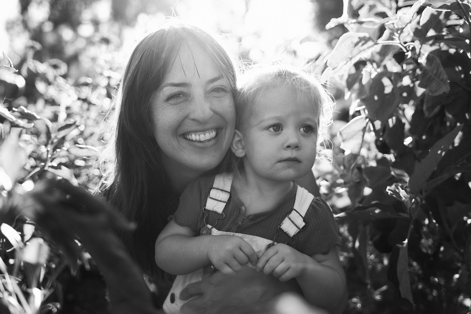 Black and white outdoor portrait session in natural lighting.