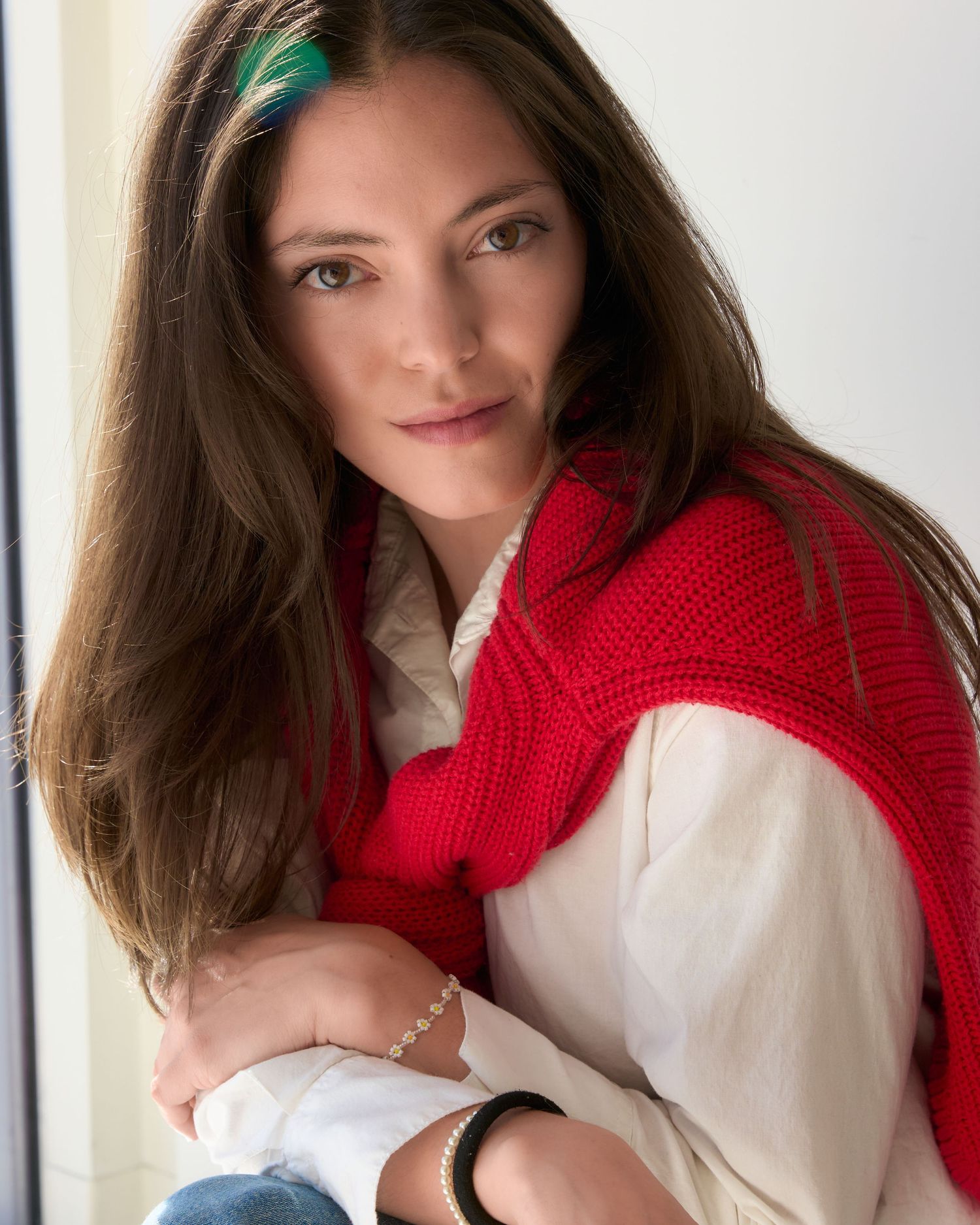 Lifestyle portraits featuring red scarf and white shirt in casual poses.