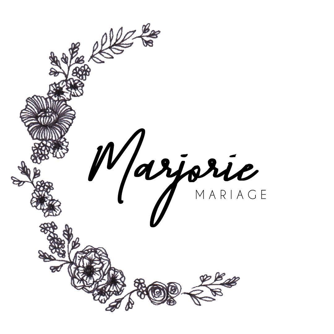 Elegant wedding logo design for Marjorie Mariage with floral wreath illustration.