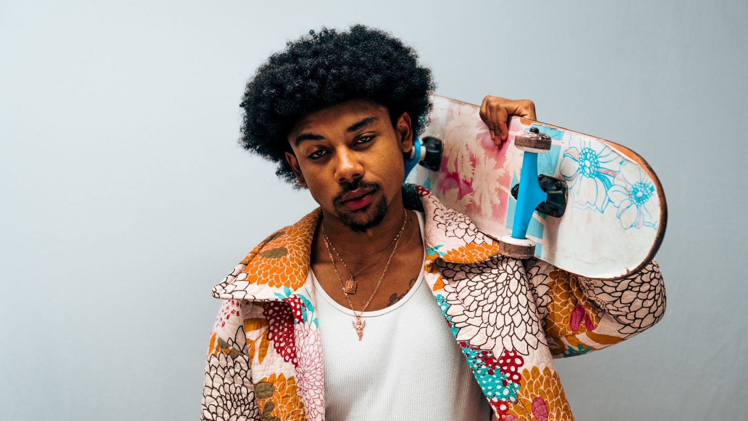 Action sequence shows skateboarder with leopard print sleeve performing tricks with a colorful board.