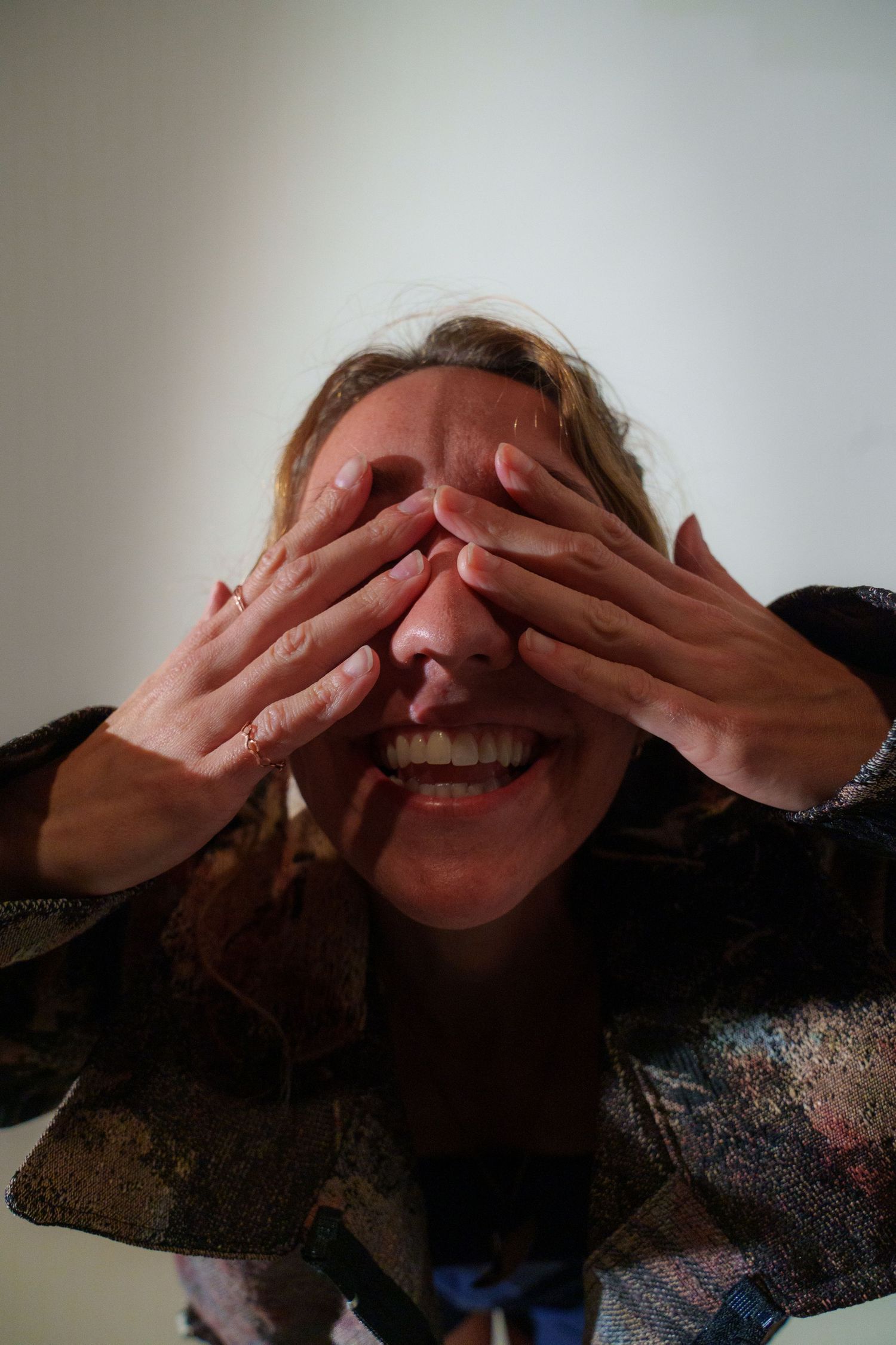 Sequence showing hands covering eyes in a playful peek-a-boo gesture.