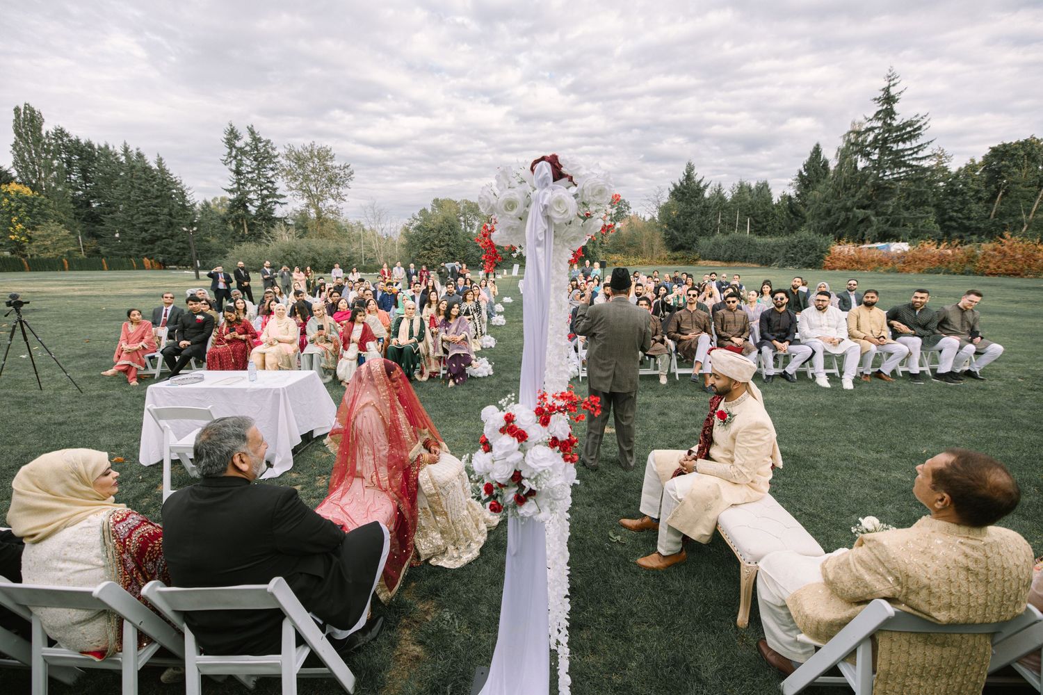 Outdoor Nikah ceremony with guests seated on lawn, Muslim wedding, Fraser Valley