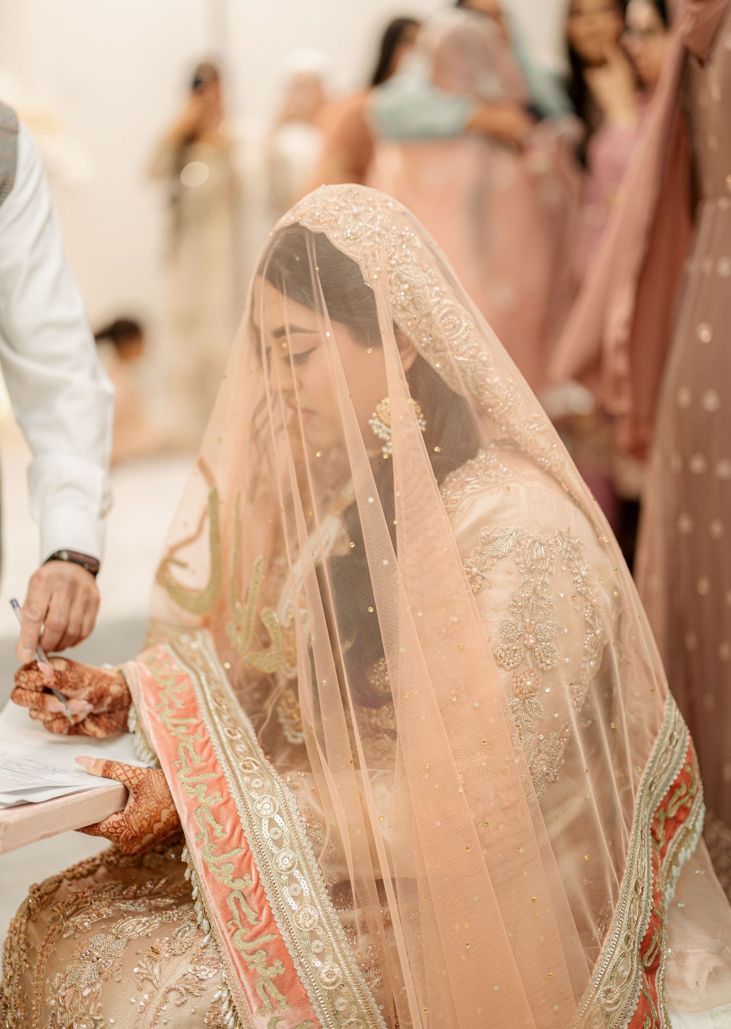 Bride with ornate bridal veil, close portrait, Muslim wedding photography