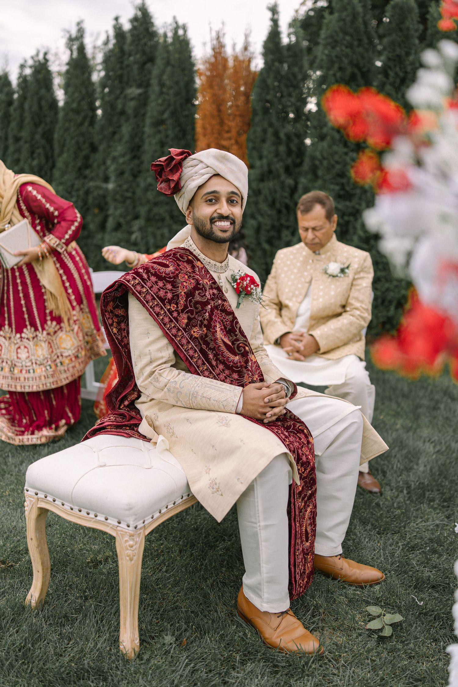 groom seated and waiting for the bride to come in traditional attire, garden Nikah portrait
