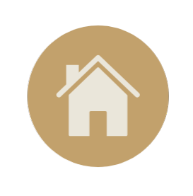 Cream house icon with chimney and arched doorway centered on a tan circular background, symbolizing home or homepage navigation.