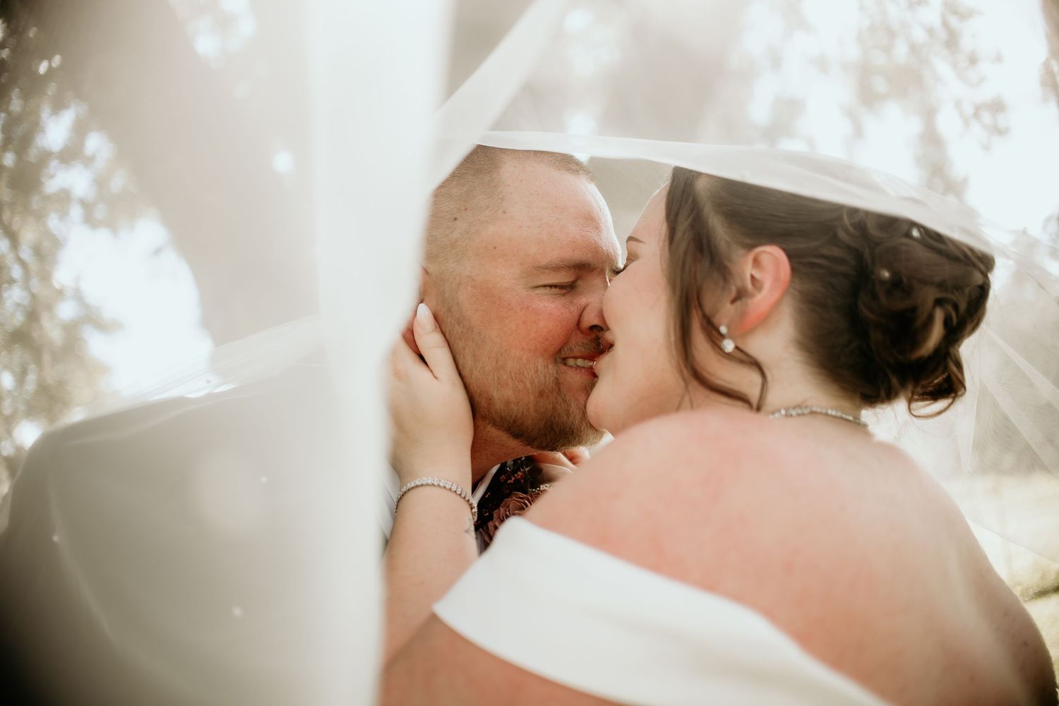 Intimate wedding portrait sequence showing tender moments between couple.