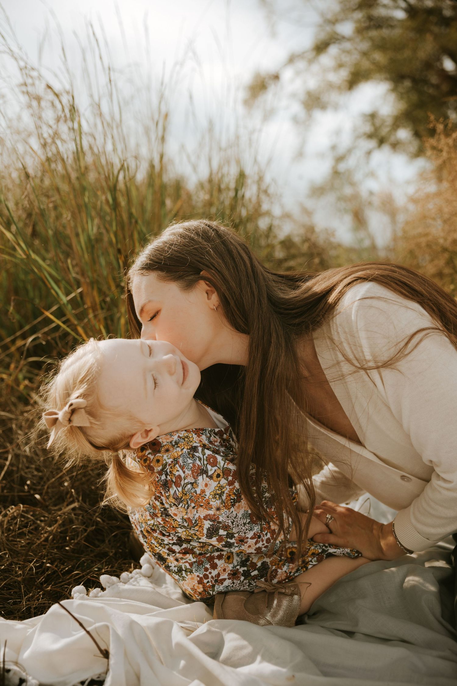 Documentary family photography in Evans Georgia capturing genuine connection outdoors