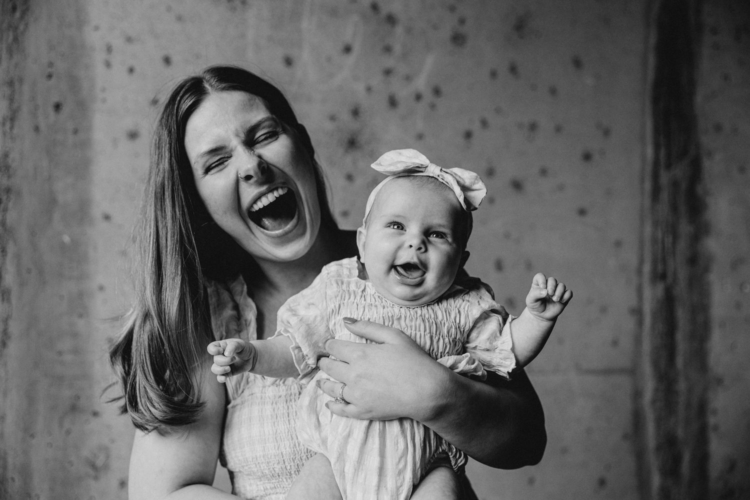 Tender moment between a mother and daughter captured in natural light in Evans Georgia