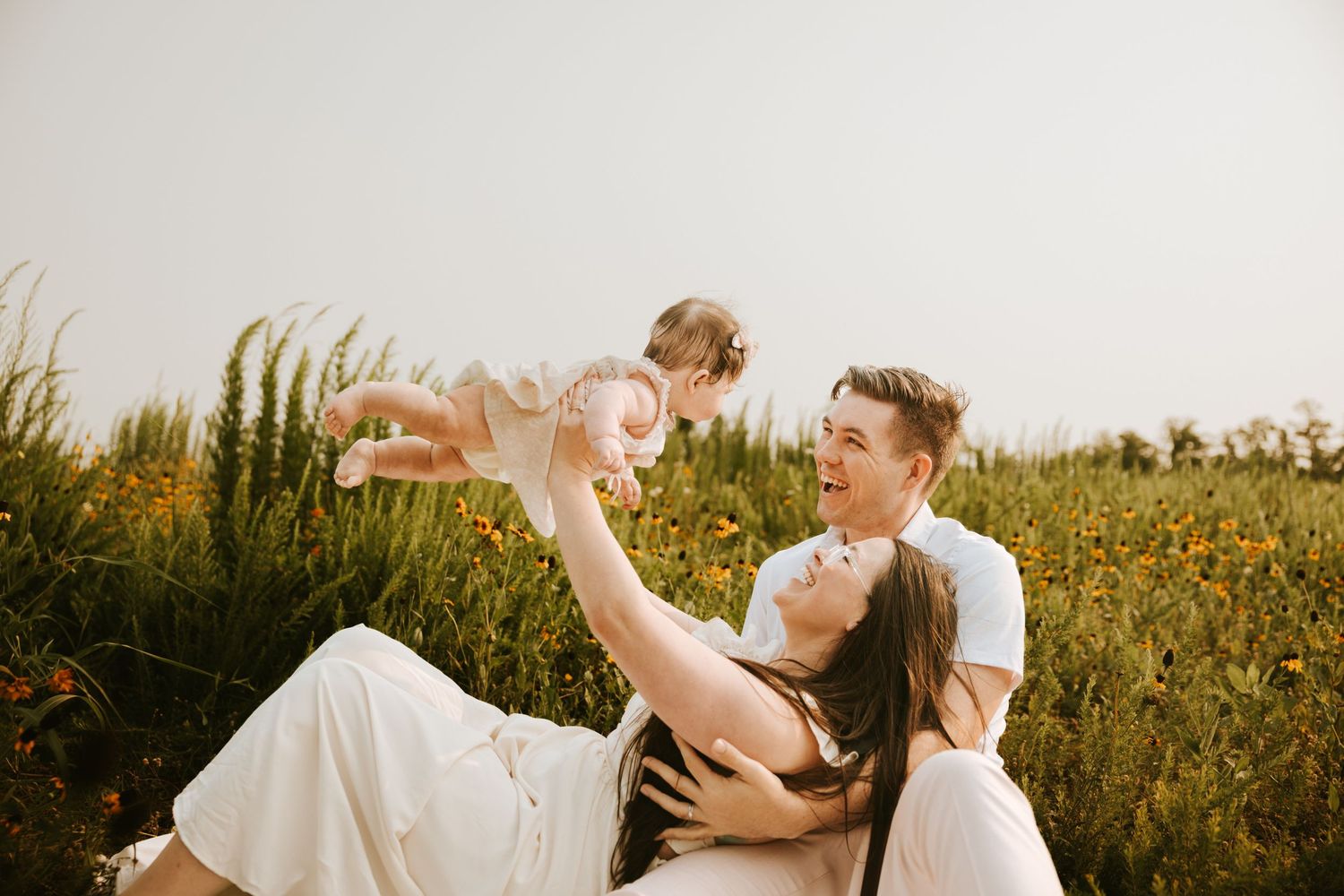 Parents holding their baby during a family photography session in Grovetown Georgia