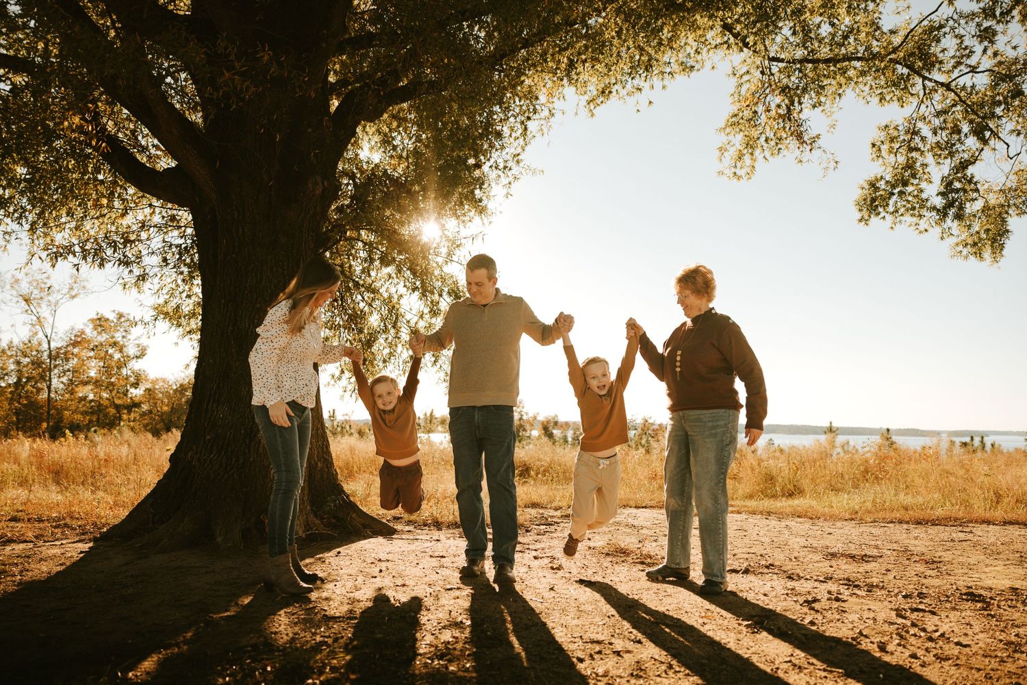Parents and baby sharing a quiet, love-filled moment during a lifestyle session in Evans, GA