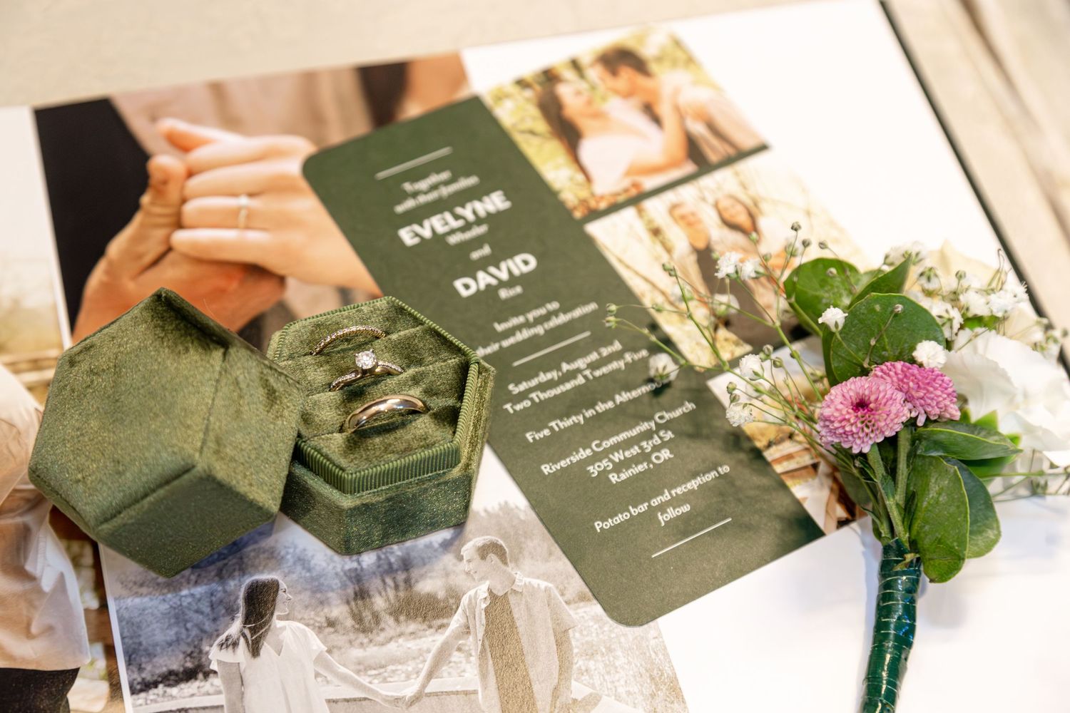Wedding invitation suite for Evelyne and David displayed with a green velvet ring box and floral boutonniere.