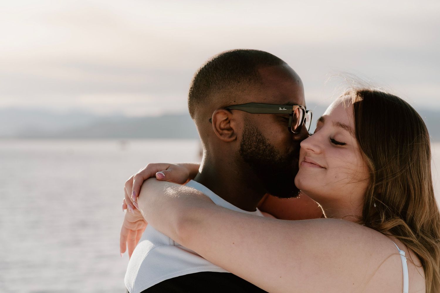 Romantic couple embracing during Utah Salt Flats engagement session