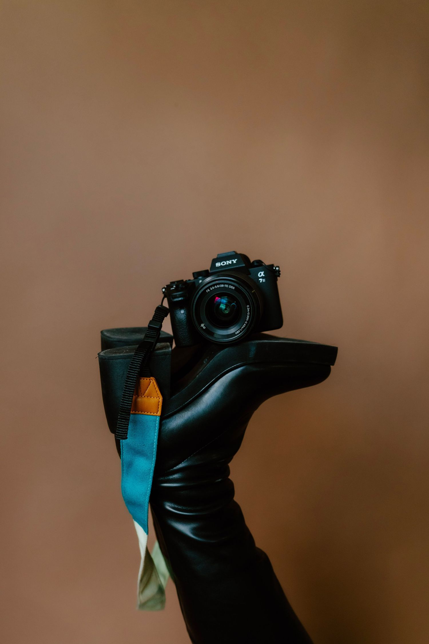 Creative branding image of camera resting on feet for photography business website