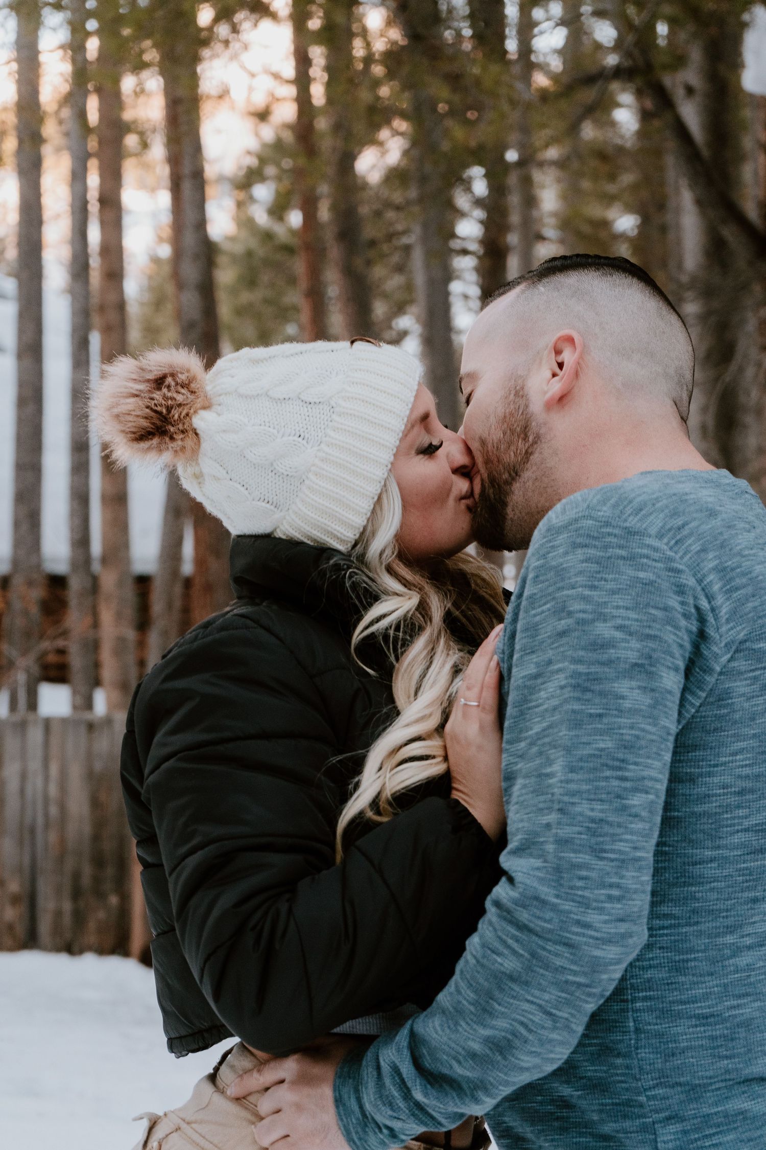 Couple kissing in the mountains during romantic Utah photo session