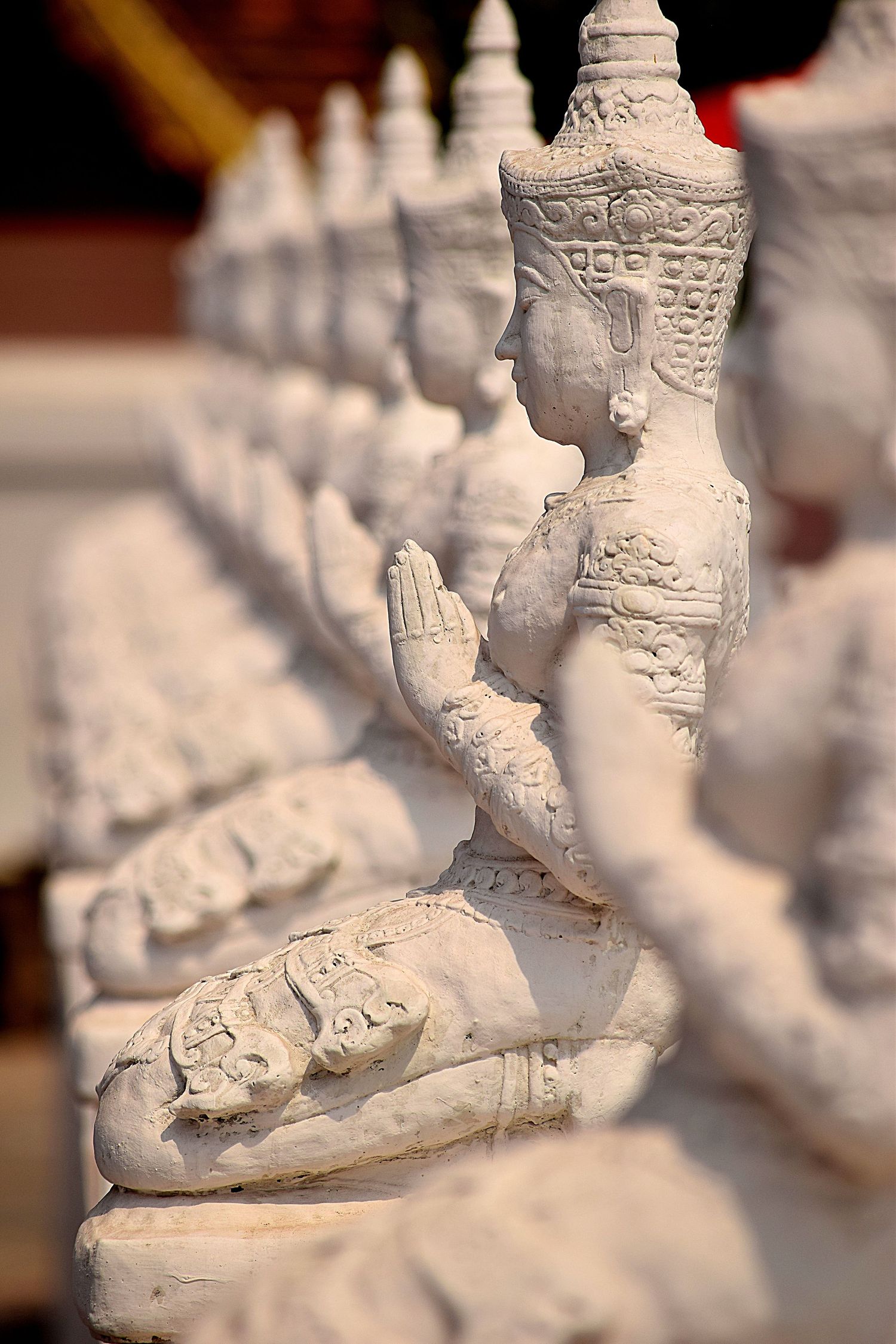 Buddhist statues praying. Thailand. Chiang Mai
