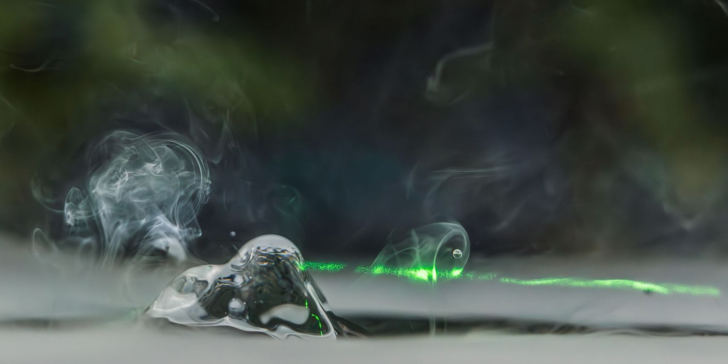 Drop Motion series: Water drop, laser, and fog art photography.