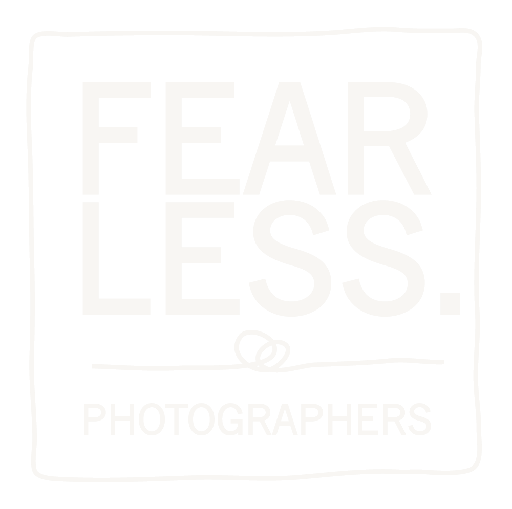 Fearless Photographers logo in white on a light background, featuring bold typography and a camera icon.
