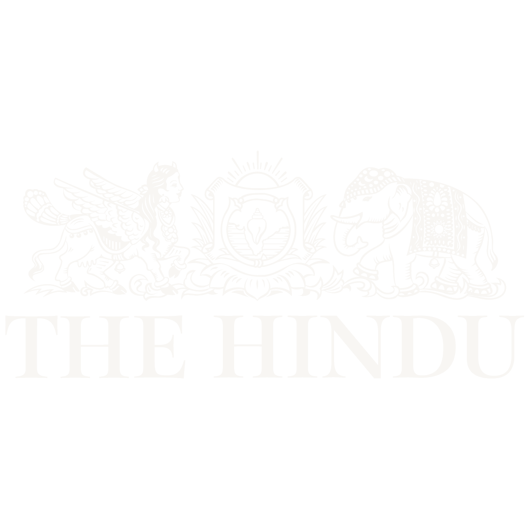 The Hindu newspaper logo displayed in white on a white background with decorative emblem.