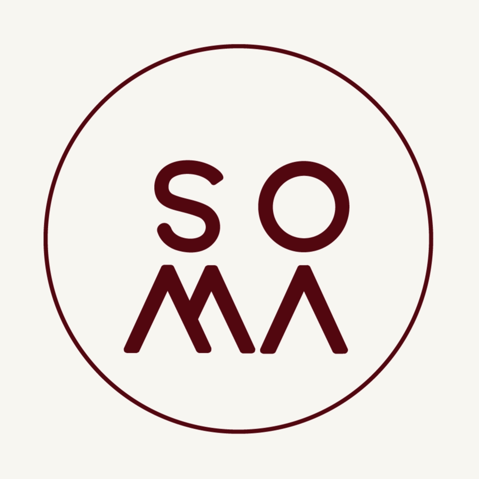 SOMA brand logo in dark red text inside a circle on a cream background.