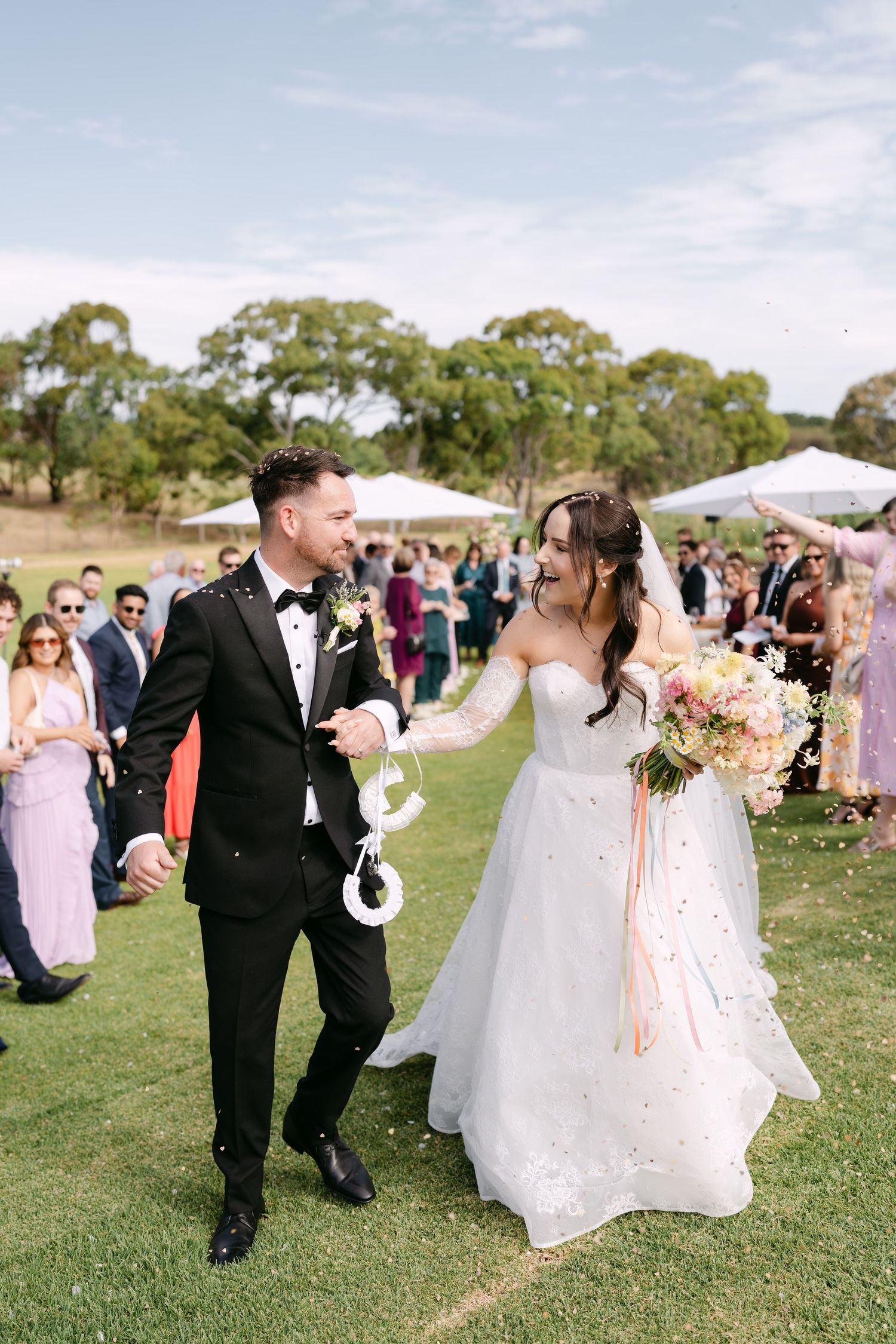 Erin and Marcus sharing a quiet moment among the vines at Lloyd Brothers, McLaren Vale wedding photographer