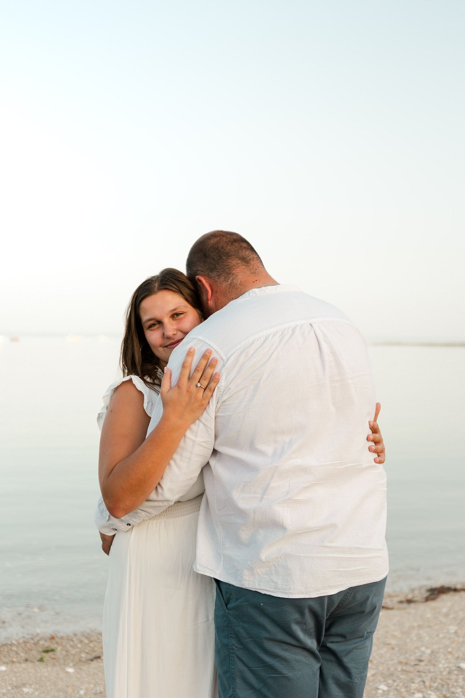 Photo couple plage mer côte