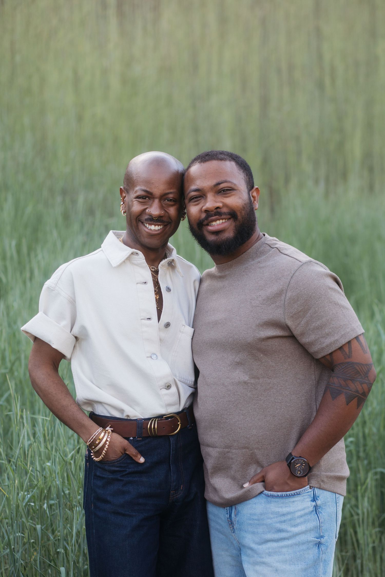 Adult son posing with mother during a spring extended family photography session at Camel’s Back Park in Boise.
