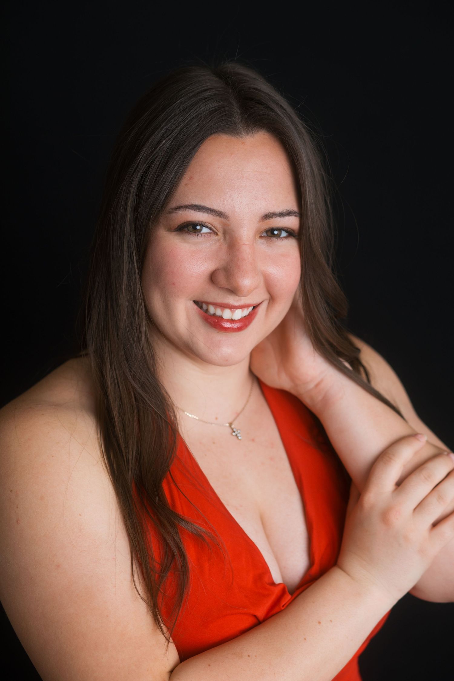 Studio headshot of young woman with natural smile and soft lighting, Boise Idaho photographer