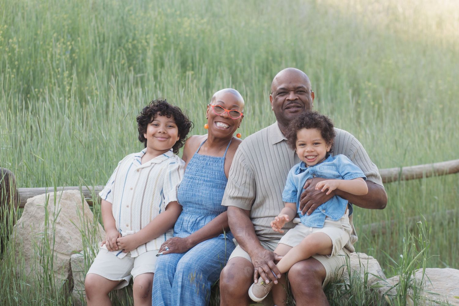 Grandparents posing with grandchildren outdoors at Camel’s Back Park during a spring family photography session.