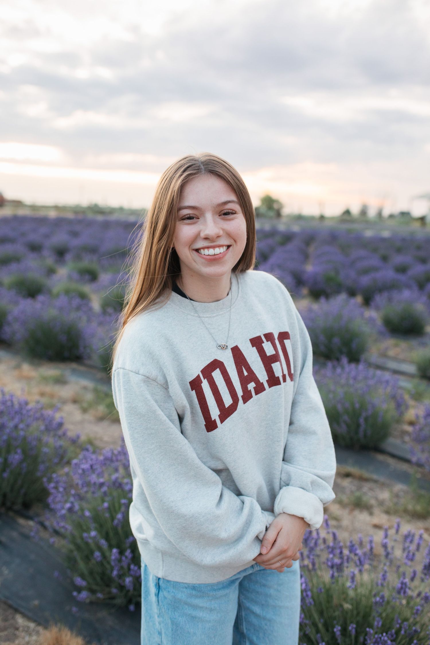 Boise Idaho outdoor headshot in lavender field with natural light and relaxed expression
