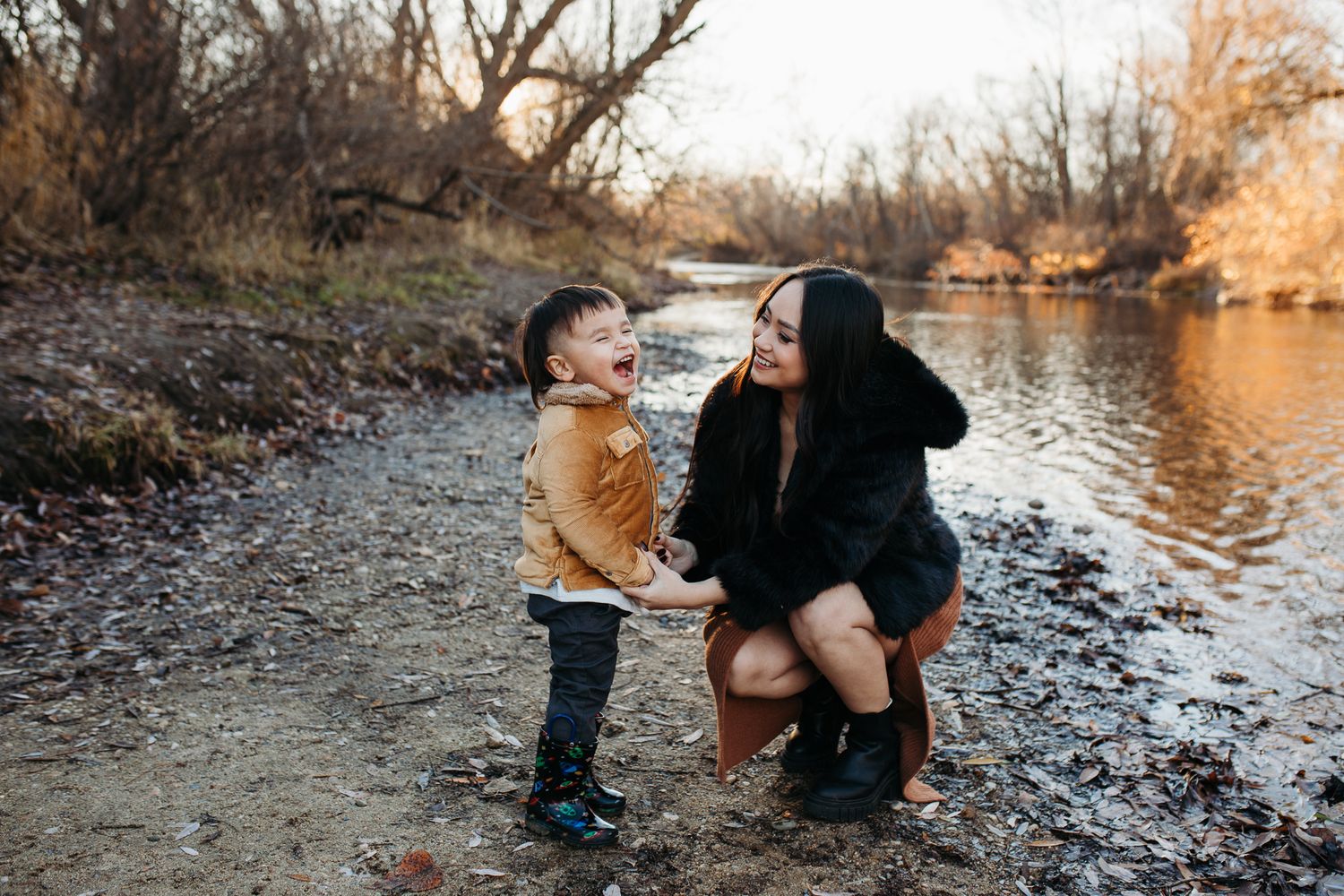 A series of outdoor photos at sunset showing a family by a river bank with warm golden lighting and natural scenery - lifestyle family