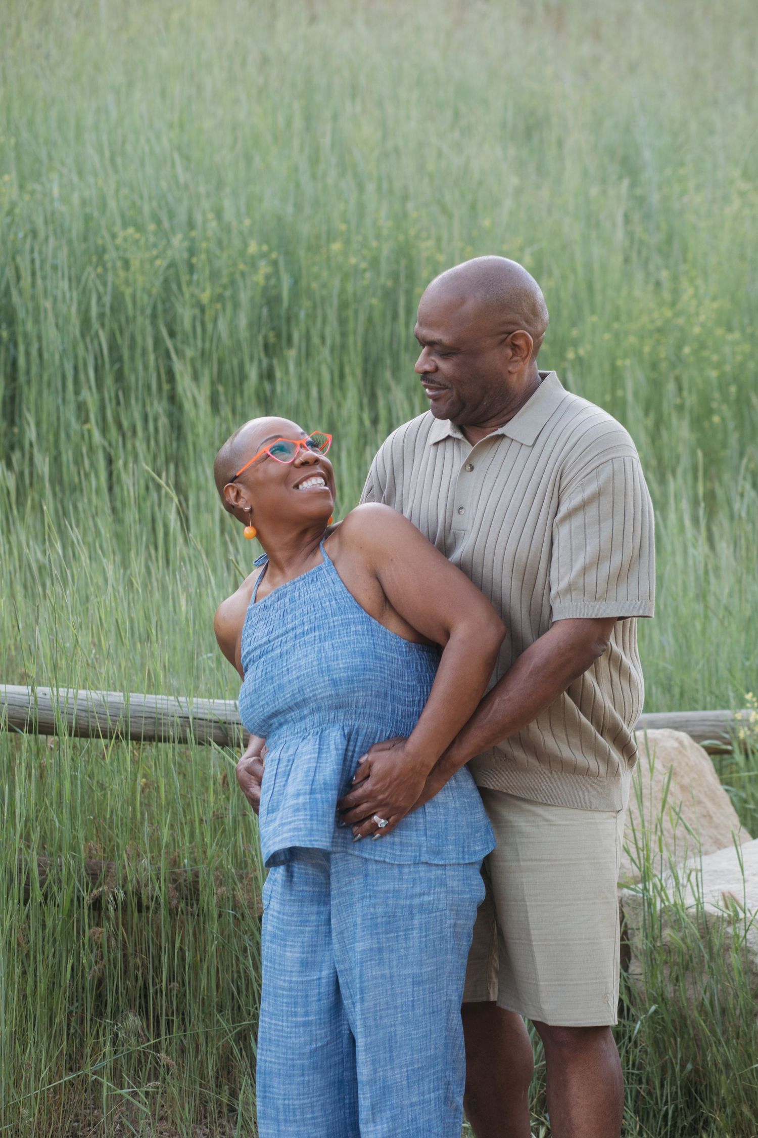 Grandparents embracing during a spring extended family photography session at Camel’s Back Park in Boise.