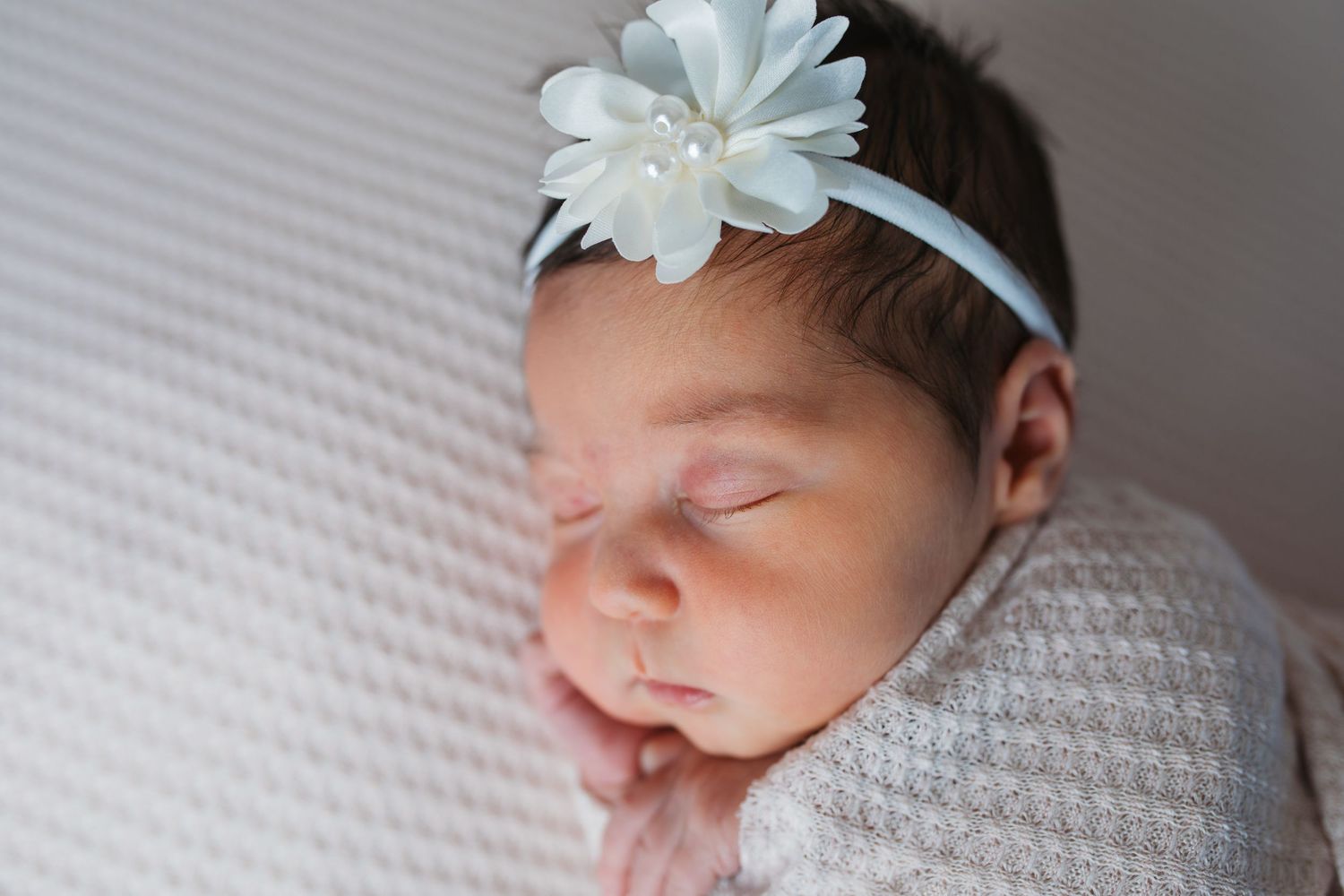 Close up newborn portrait highlighting tiny details during a newborn mini session in Nampa, Idaho