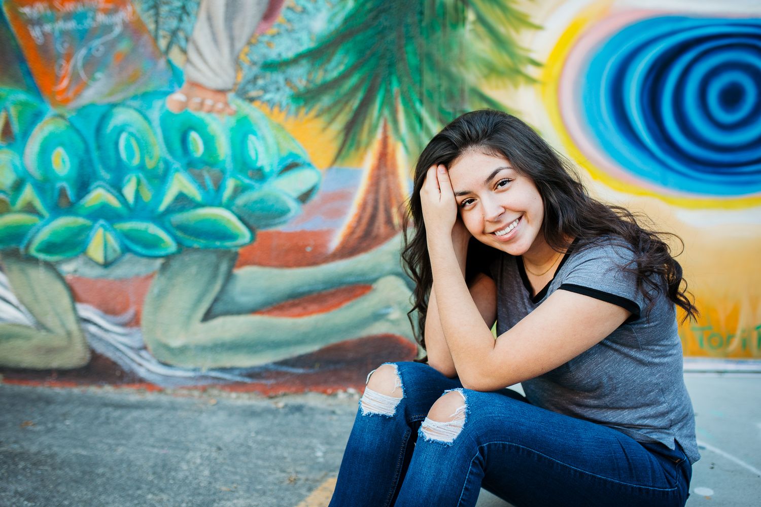 Boise senior portrait at Freak Alley mural downtown