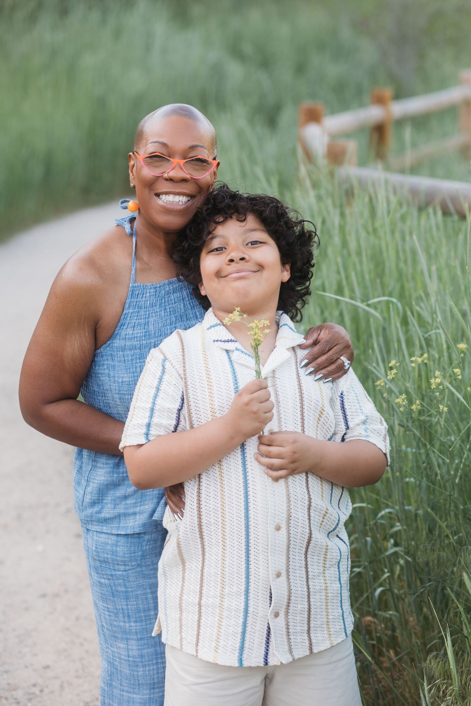 Grandmother smiling with grandson during a spring extended family photography session at Camel’s Back Park in Boise.
