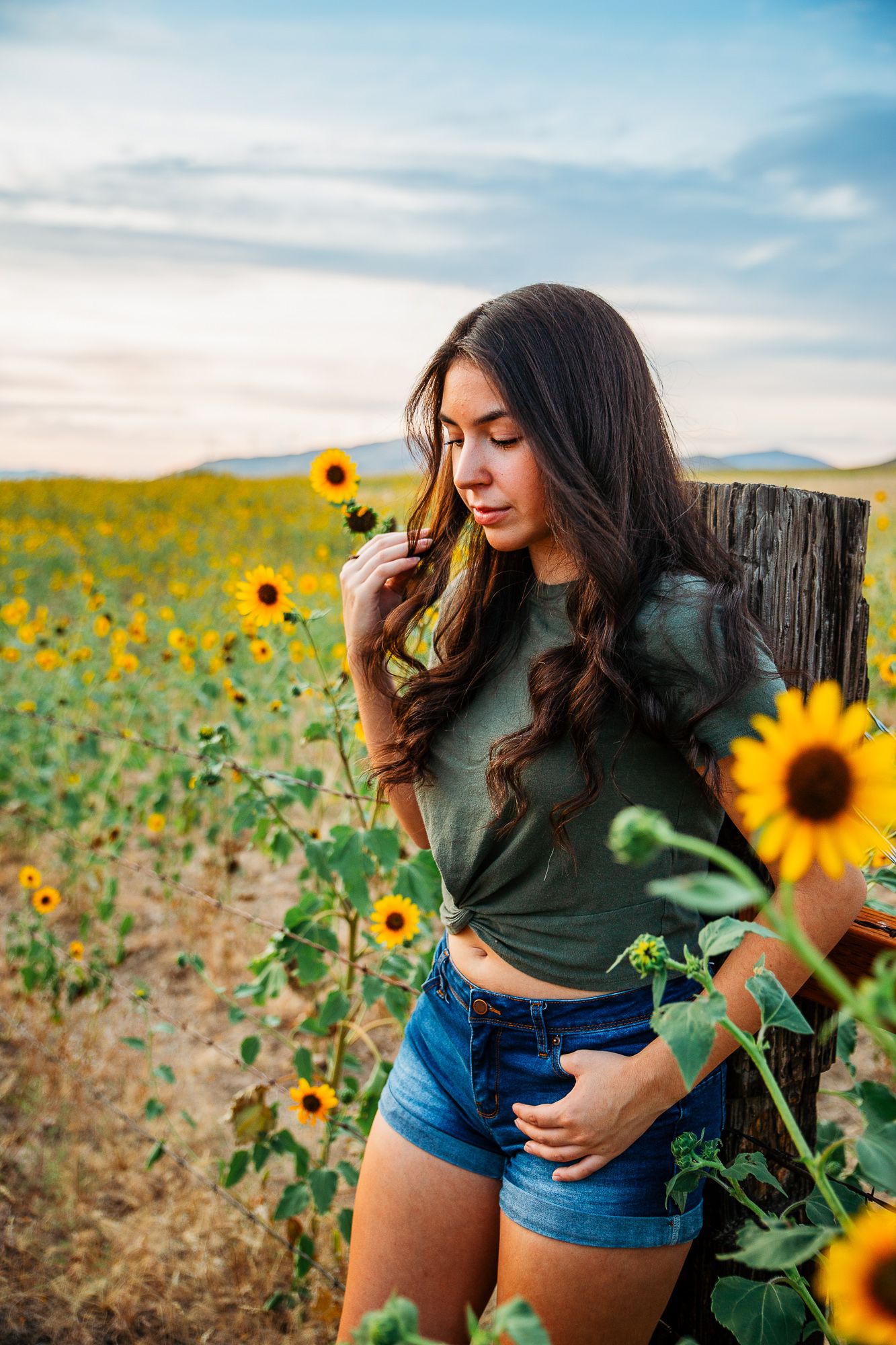 Sunflower field senior photos in Treasure Valley during summer photo session