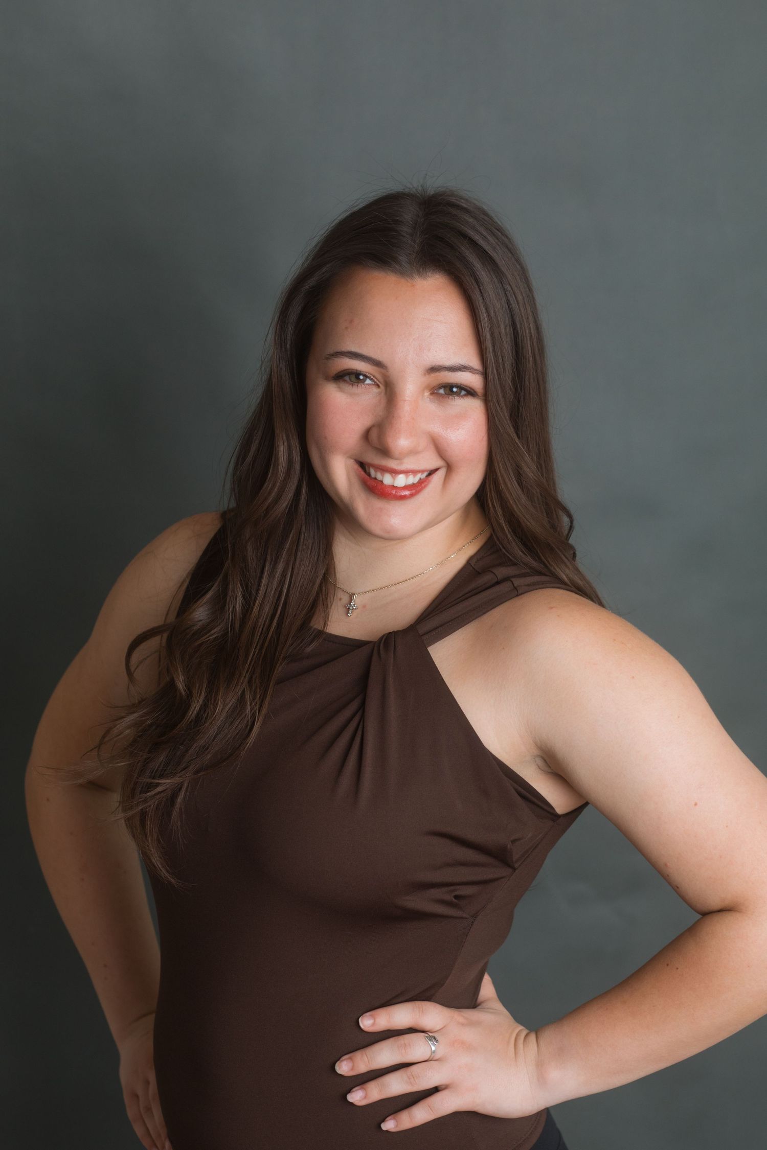 Professional female headshot in studio with confident pose and natural expression, Boise Idaho photographer