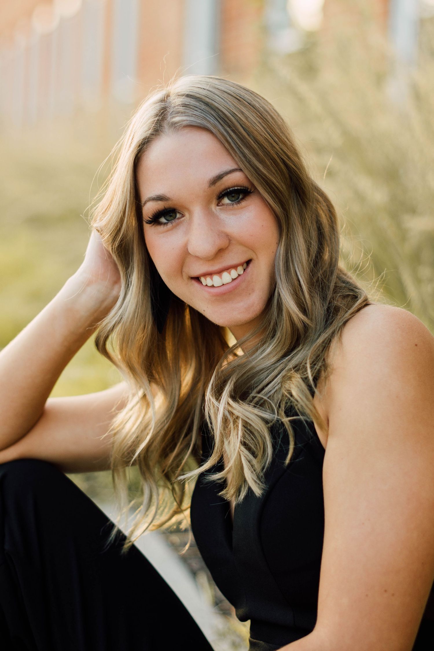 Casual outdoor headshots showing warm expressions and natural lighting.