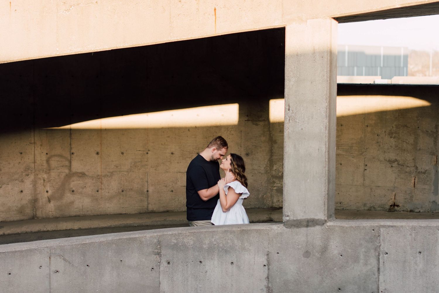 Urban photography session under concrete architecture.