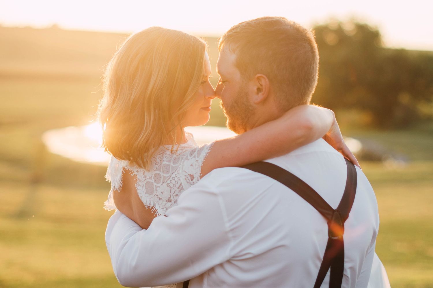 Romantic sunset wedding photos with golden hour lighting.