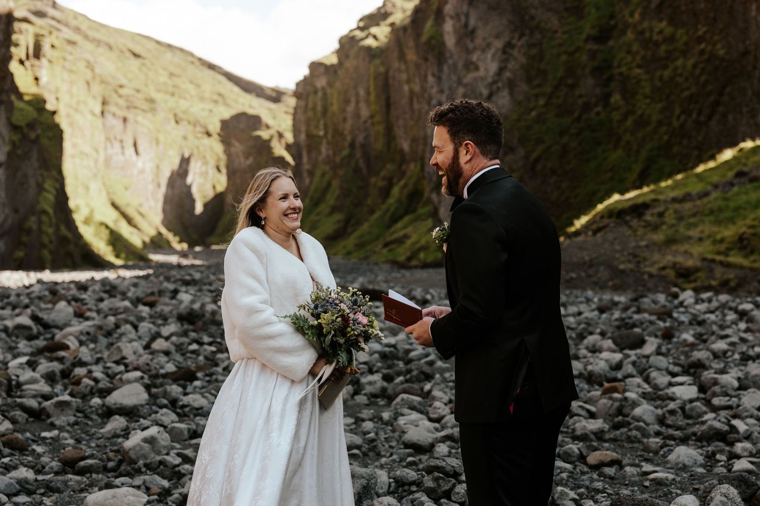 bride and groom laughing during groom's vows in Þórsmörk (Thórsmörk), Iceland