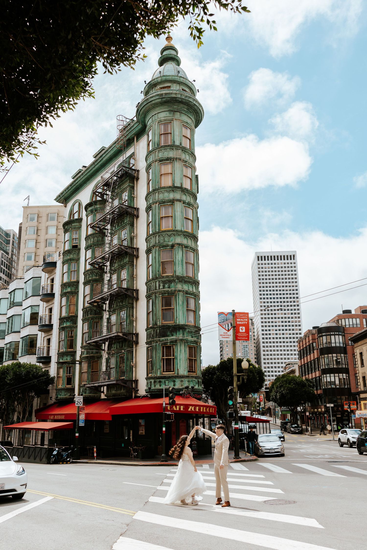 north beach, san francisco elopement photos. couple running in the street. authentic and fun elopement in the bay area.