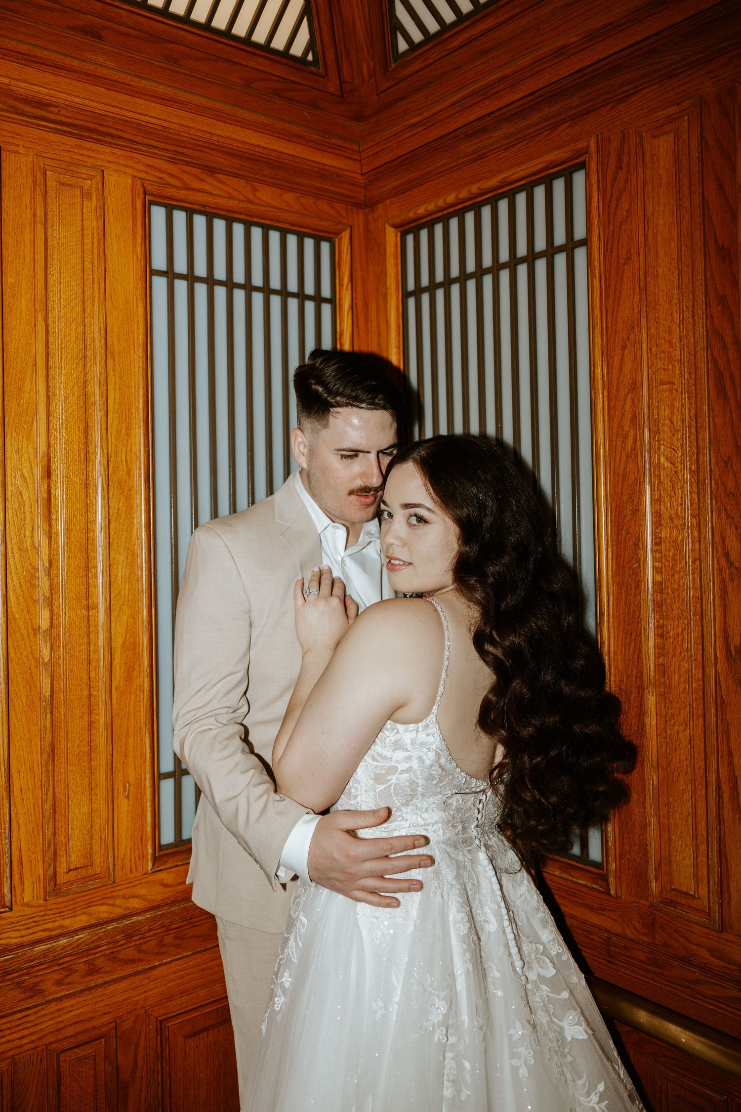 eloping couple in elevator during romantic day in san francisco. bay area elopement photographer