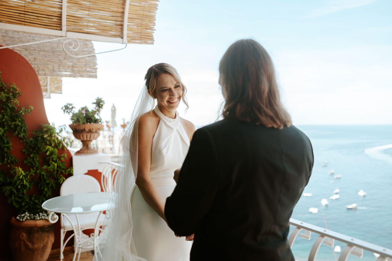 groom reading vows to bride during Amalfi Coast elopement, Italy
