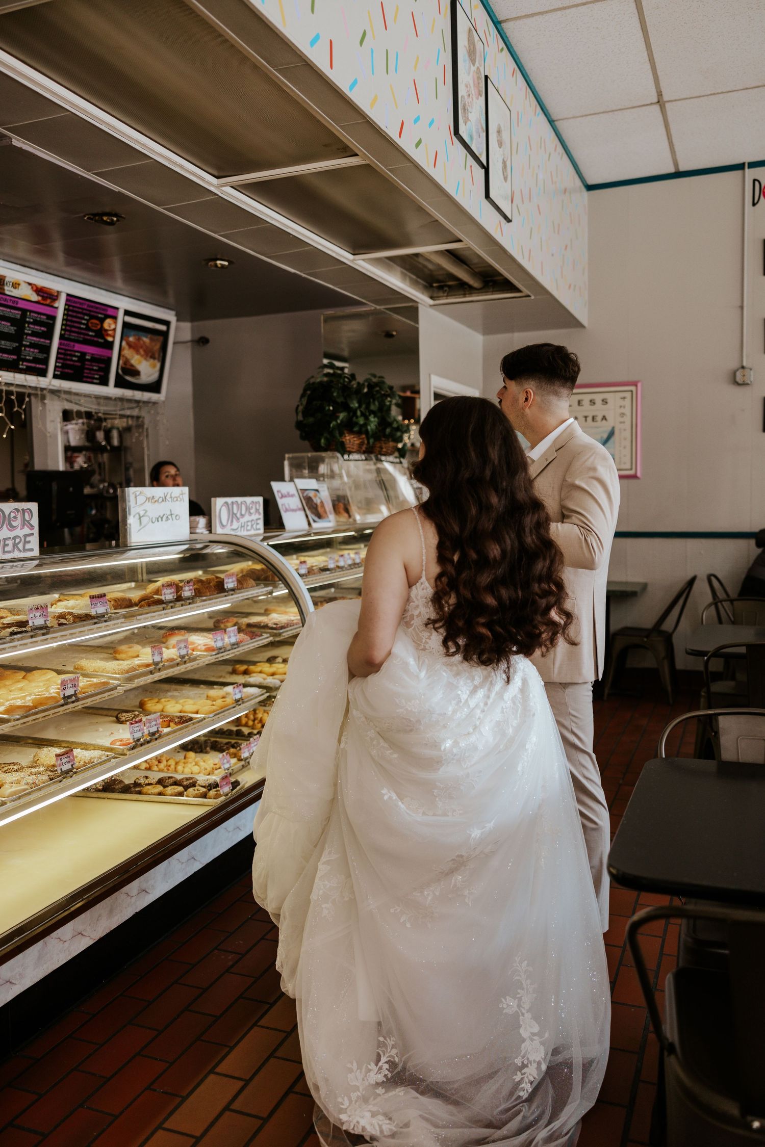 eloping couple getting food at a cafe during their san francisco elopement day