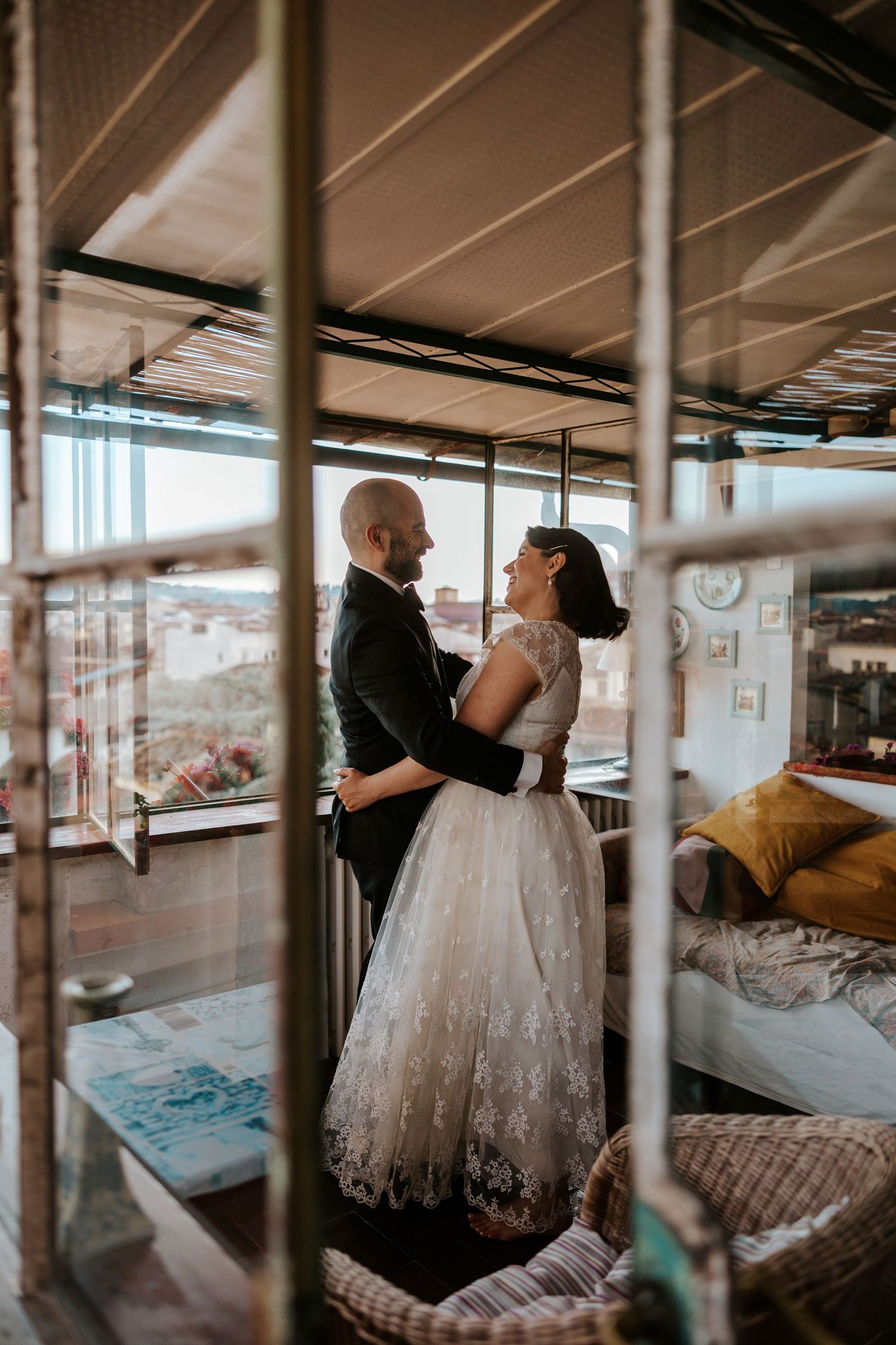 couple dancing in their airbnb in florence, italy during their all day adventure italy elopement