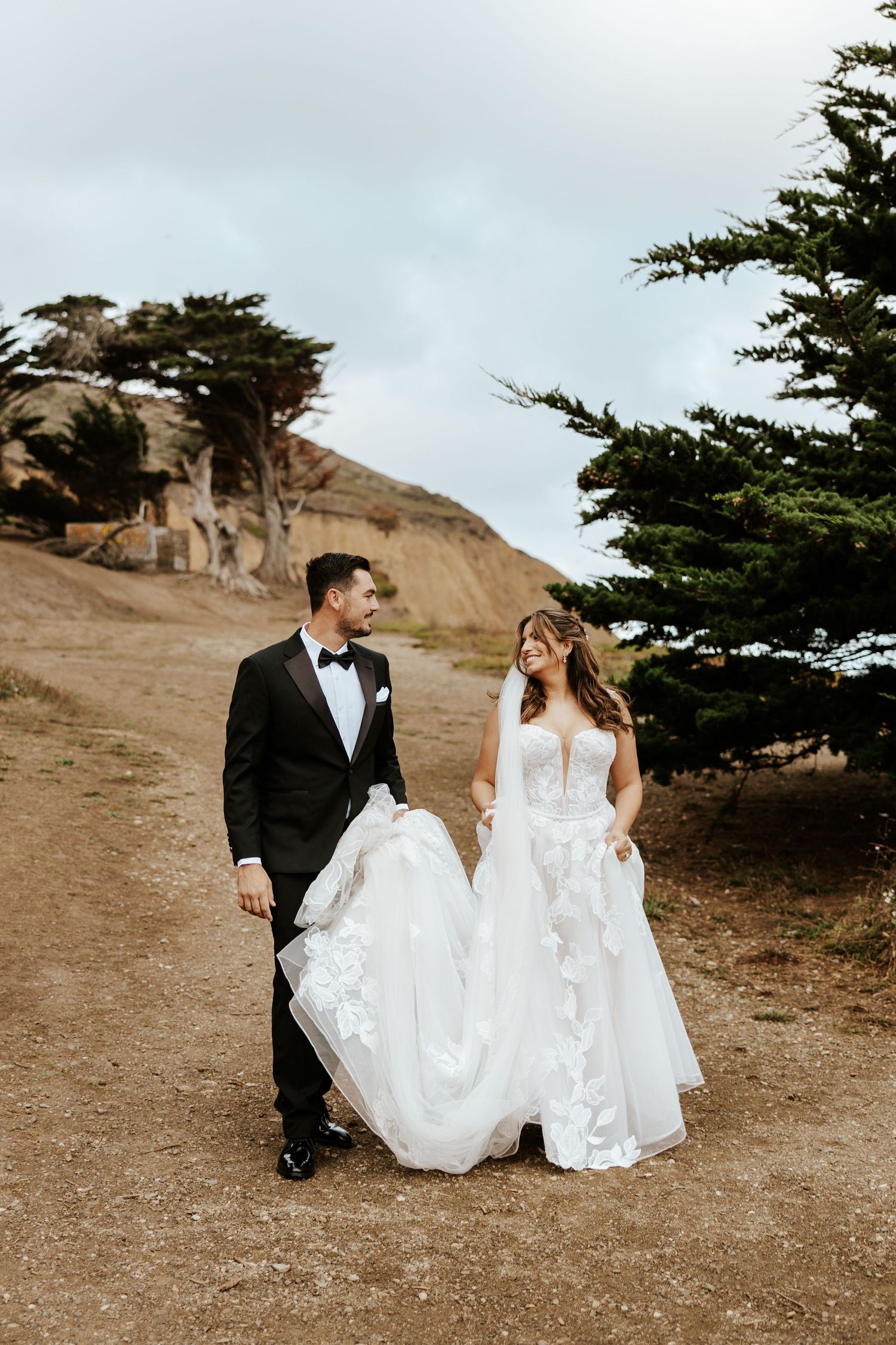 candid elopement couple walking along the coast during bay area elopement day