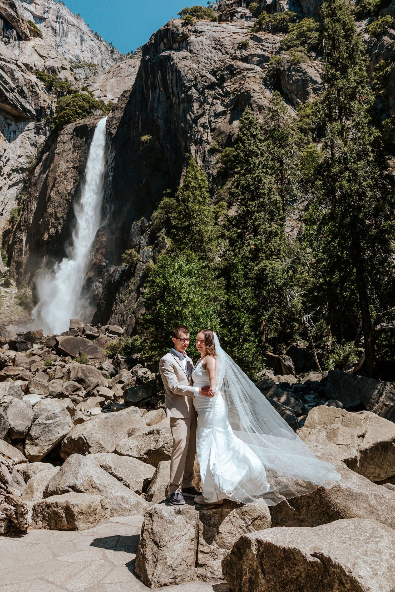 romantic and authentic yosemite national park elopement photographer at yosemite falls waterfall