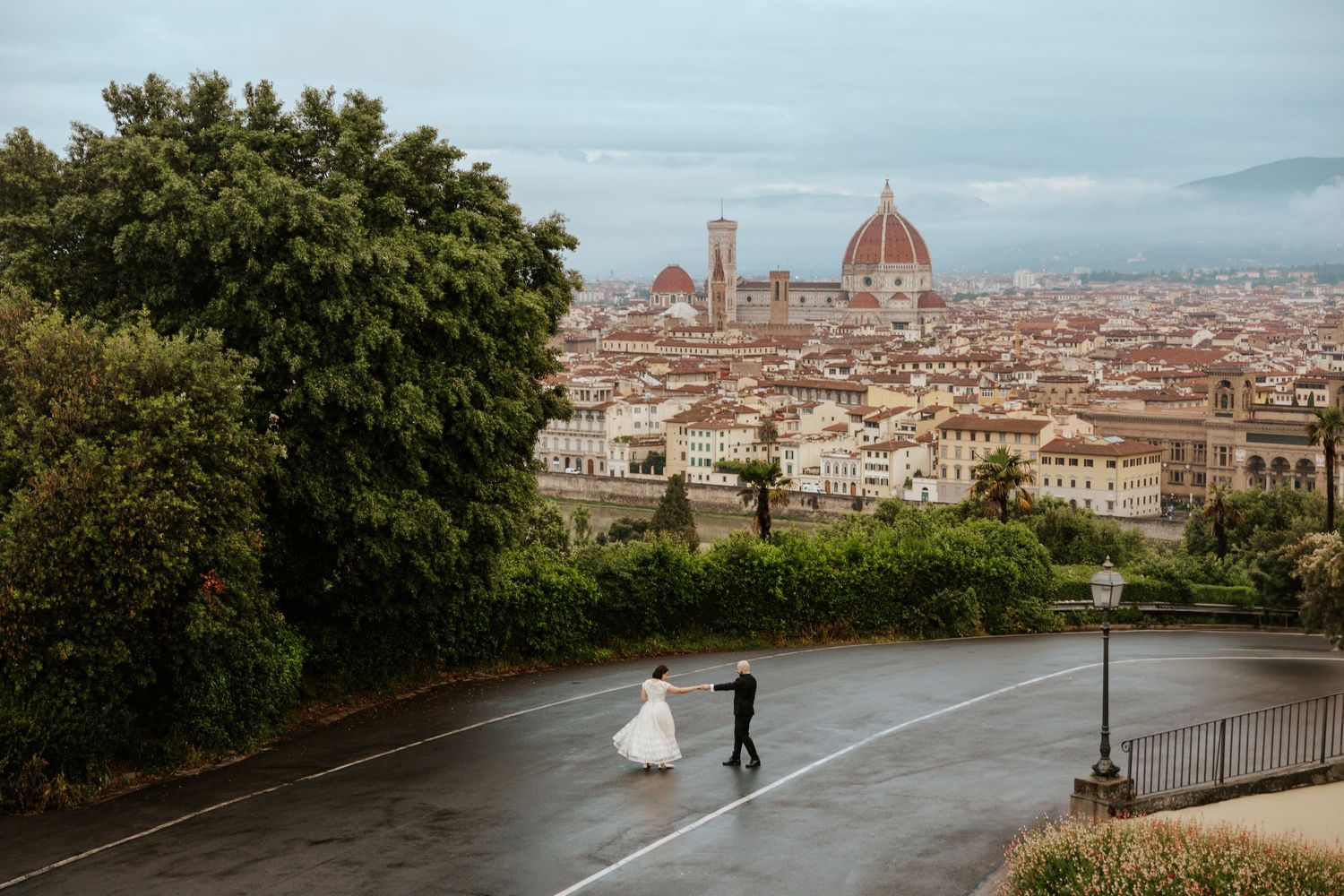 candid florence elopement at Piazzale Michelangelo during sunrise